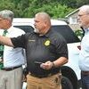 Wise County Administrator Mike Hatfield, Coeburn Police Chief Scott Brooks and Ninth District U.S. Rep. Morgan Griffith survey local flood damage late last week. Along with Coeburn, Griffith visited flooded areas in Pound and in Dickenson County. SUBMITTED PHOTO