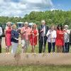 Health Wagon officials and supporters prepare to ceremonially break ground for the new clinic.  TIM COX PHOTO