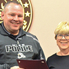 During an April 23 Town Council meeting, Wise Police Chief Kevin Yates receives a proclamation from Mayor Teresa Adkins declaring May 12 through 18 as Police Week. ‘We thank Kevin and all of his officers for everything they do’ and that they handle each call with dignity and helpfulness, said Adkins.  KENNETH CROWSON PHOTO
