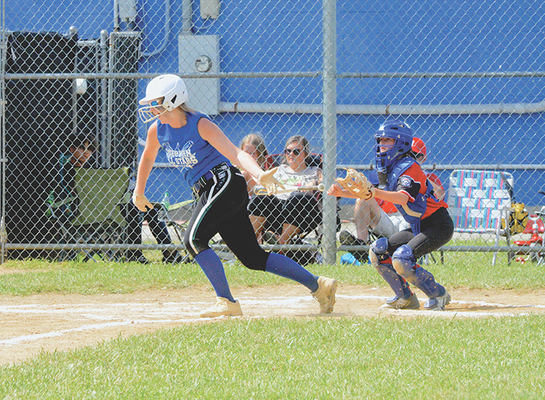 Lexi Bond sends a shot to the outfield for the Coeburn team. PHOTO BY KELLEY PEARSON