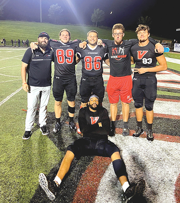 Coach Riley Bodine (back row, left) with some of his players who will now be brothers on the field. PHOTOS COURTESY OF RILEY BODINE