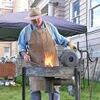 Blacksmith Mark Ramsey attracted crowds to the county courthouse lawn Saturday, demonstrating his craft at the Wise Fall Fling.  JEFF LESTER PHOTO