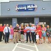 The area’s first Jersey Mike’s sub shop has opened in Norton. City officials, Chamber of Commerce representatives and others cut the ribbon May 17.  CHAMBER OF COMMERCE PHOTO