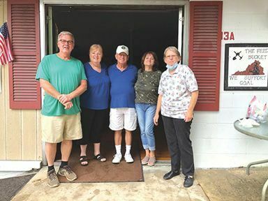 The new food bank location at 8033 Main Street in Pound. This is the building across from the Pizza Plus that was once the home of The Feed Bucket. Picture are volunteers, Johnny Tompkins, Liz Neimier, Wendell Maggard, Felicia Powers, and Charlene Shortt.