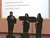 Left to right are band Director Joseph McNulty, eighth grade clarinet player Molly Bolling and seventh grade alto saxophone player Hannah Mullins performing ‘Shenandoah’ at the county School Board meeting.  KENNETH CROWSON PHOTO