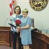 Dr. Sue Cantrell, left, receives the award from Wise Mayor Teresa Adkins.  TOWN OF WISE PHOTO